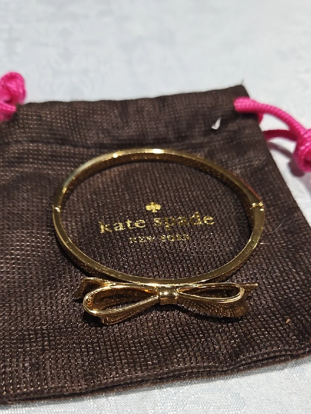 kate spade Gold Bow Bangle Bracelet - Picture 1 of 5
